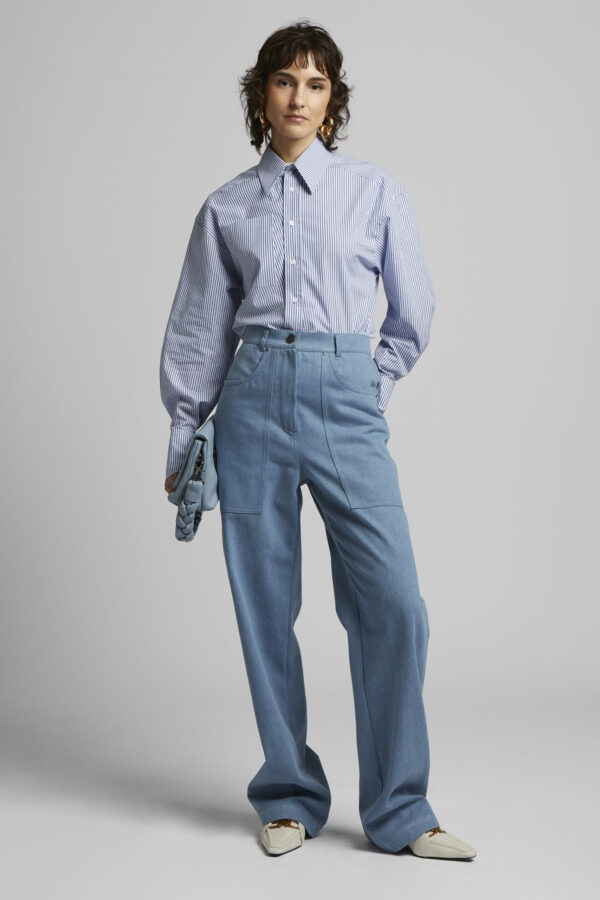 Model wearing MIOMARTHA tailored jeans and loose fit striped cotton shirt - SKU 2022HH002
